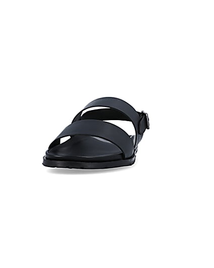 360 degree animation of product Black leather double strap sandals frame-22