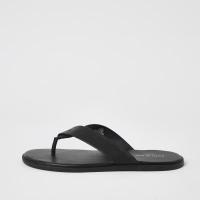 black leather flip flops