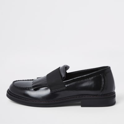 Black leather fringe loafers