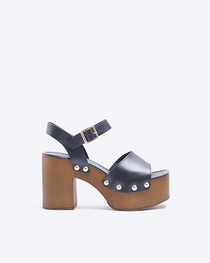Black leather heeled clogs