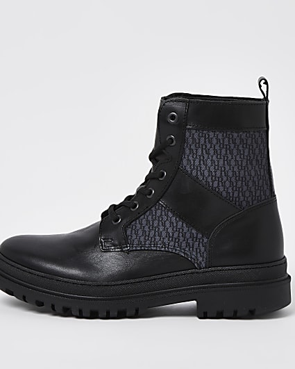 Black leather monogram lace up boots