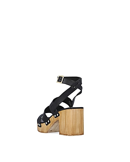 360 degree animation of product Black leather platform heeled sandals frame-7