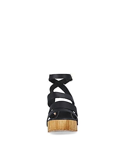 360 degree animation of product Black leather platform heeled sandals frame-21