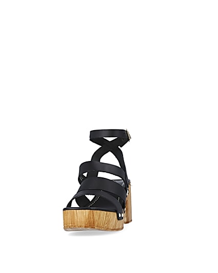 360 degree animation of product Black leather platform heeled sandals frame-22