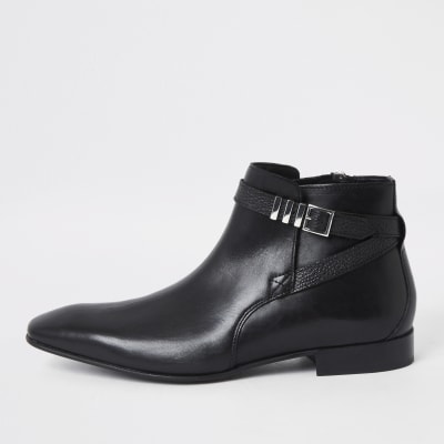 pointed toe buckle boots