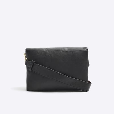 Black leather quilted cross body bag River Island
