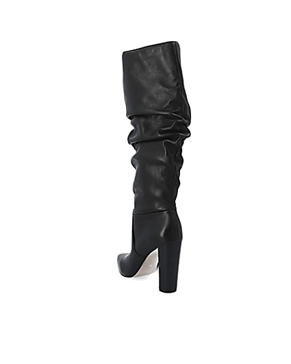 360 degree animation of product Black leather slouch heel boot frame-7