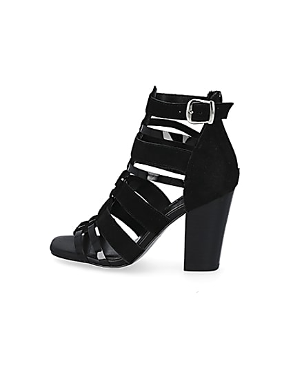 360 degree animation of product Black leather strappy heeled sandals frame-4