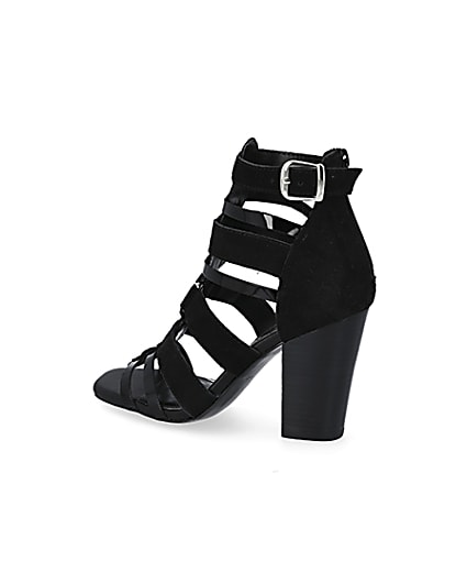 360 degree animation of product Black leather strappy heeled sandals frame-5