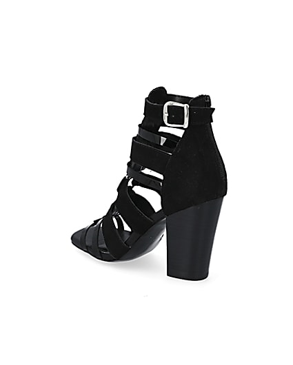 360 degree animation of product Black leather strappy heeled sandals frame-6