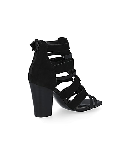 360 degree animation of product Black leather strappy heeled sandals frame-13