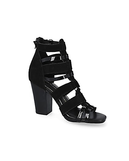 360 degree animation of product Black leather strappy heeled sandals frame-17