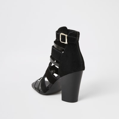 Black leather strappy heeled sandals