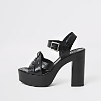 Black leather studded platform heels