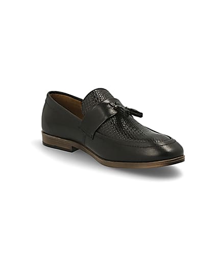 360 degree animation of product Black leather textured tassel loafers frame-18
