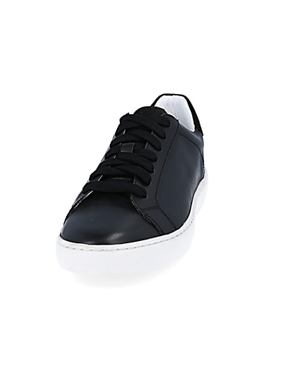 360 degree animation of product Black leather trainers frame-22