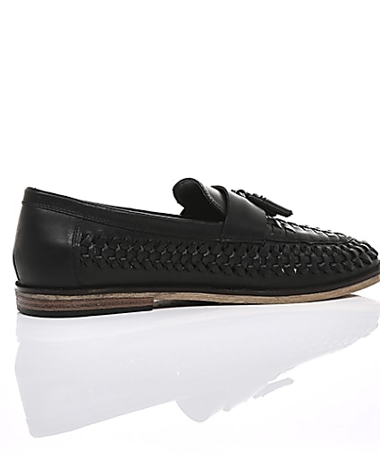 360 degree animation of product Black leather woven tassel loafers frame-11