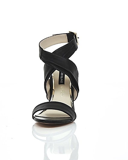 360 degree animation of product Black leather wrap skinny heel sandals frame-3