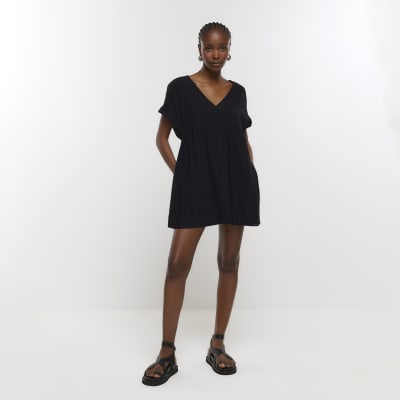 Black linen blend playsuit | River Island