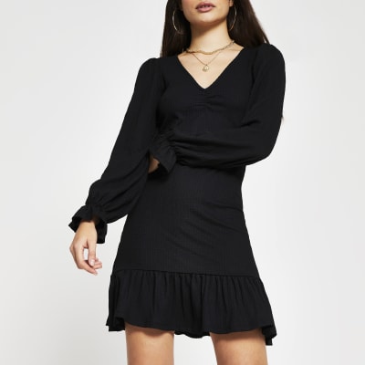 frill hem black dress