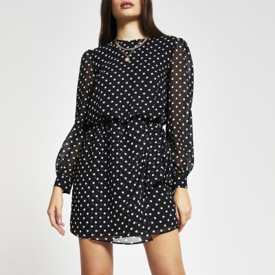 black polka dot mini dress