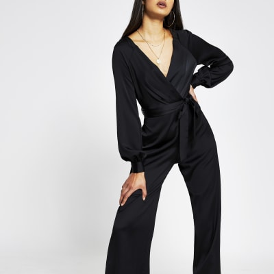 Black long sleeve satin wrap jumpsuit | River Island