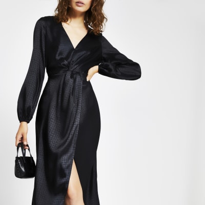 midi length black dress with sleeves