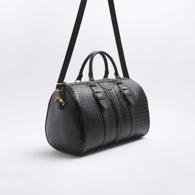 Black medium embossed RI monogram travel bag River Island