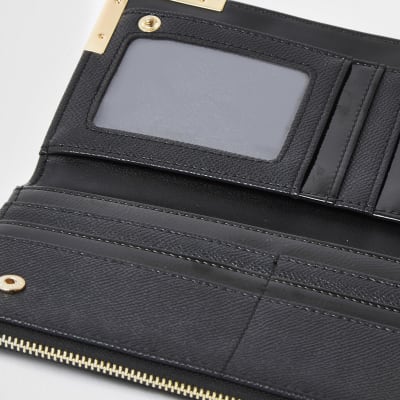 Black metal corner zip around purse