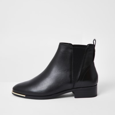 black metal trim chelsea boots
