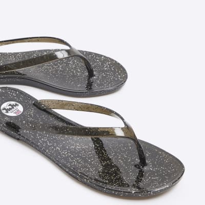 Black metallic jelly flip flop sandals River Island