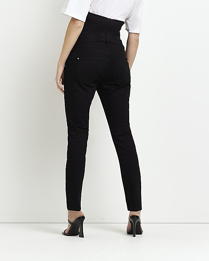 Black mid rise maternity skinny jeans