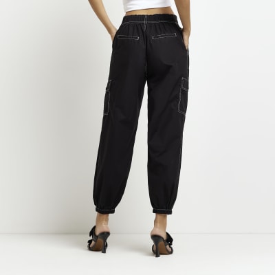 Black mid rise tapered parachute trousers River Island
