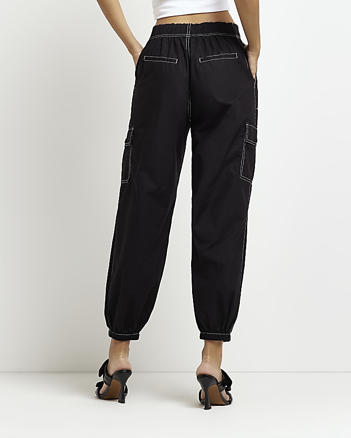 Black mid rise tapered parachute trousers