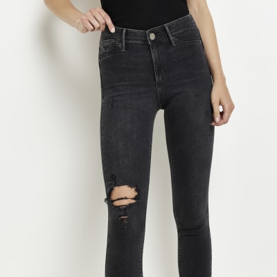 black ripped baggy jeans womens