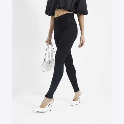 Black Molly mid rise bum sculpt skinny jeans | River Island