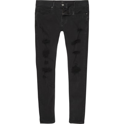 Black Ollie rip super skinny spray on jeans