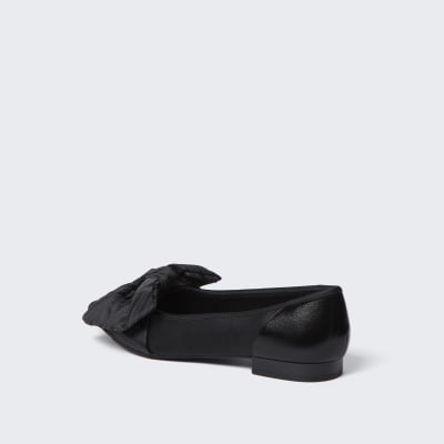 Black oversized bow flat shoes