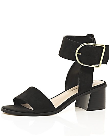 360 degree animation of product Black oversized buckle sandals frame-23