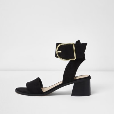 Black oversized buckle sandals