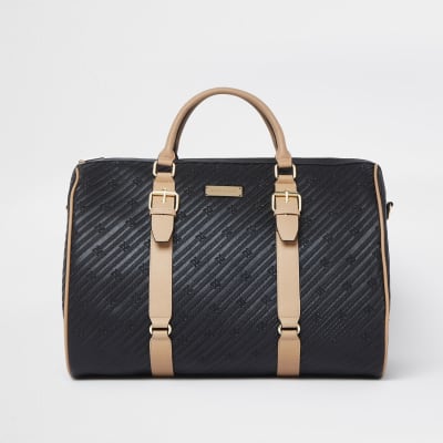 Black oversized RI embossed barrel bag River Island
