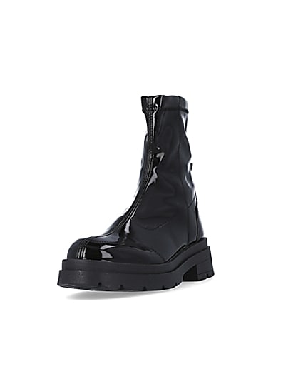 360 degree animation of product Black patent chunky ankle boots frame-23