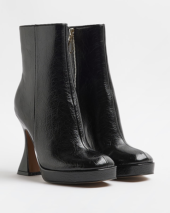 Black patent flare heeled ankle boots