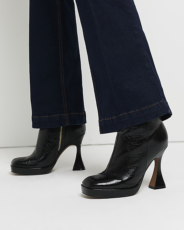 Black patent flare heeled ankle boots