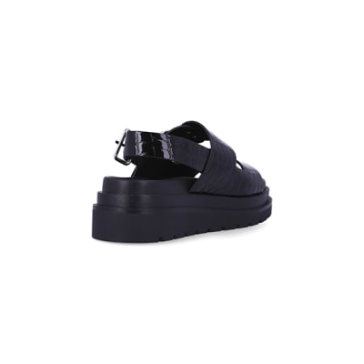 360 degree animation of product Black patent flatform sandals frame-11