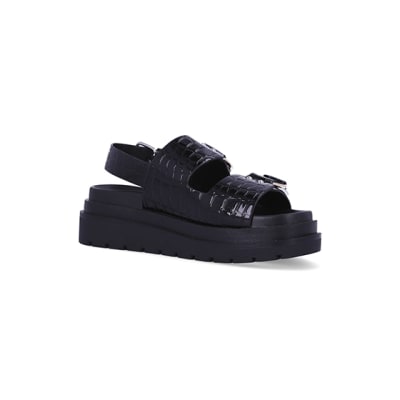 black patent flatforms