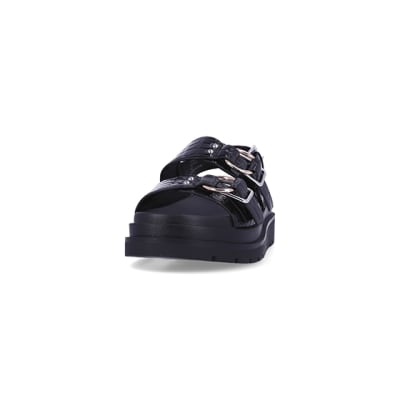 360 degree animation of product Black patent flatform sandals frame-22