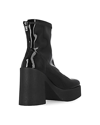 360 degree animation of product Black patent heeled biker boots frame-12