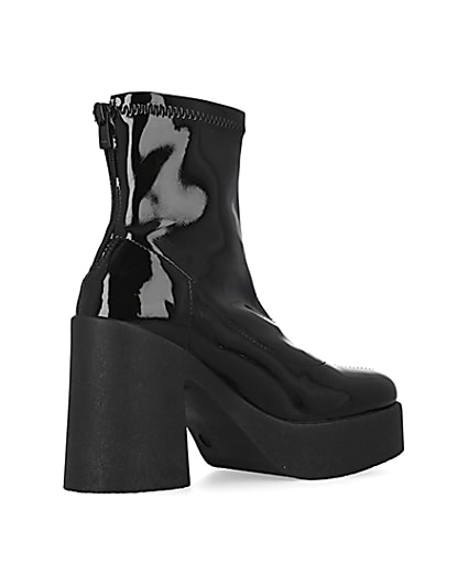 360 degree animation of product Black patent heeled biker boots frame-13
