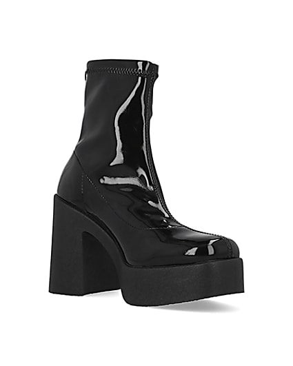 360 degree animation of product Black patent heeled biker boots frame-18